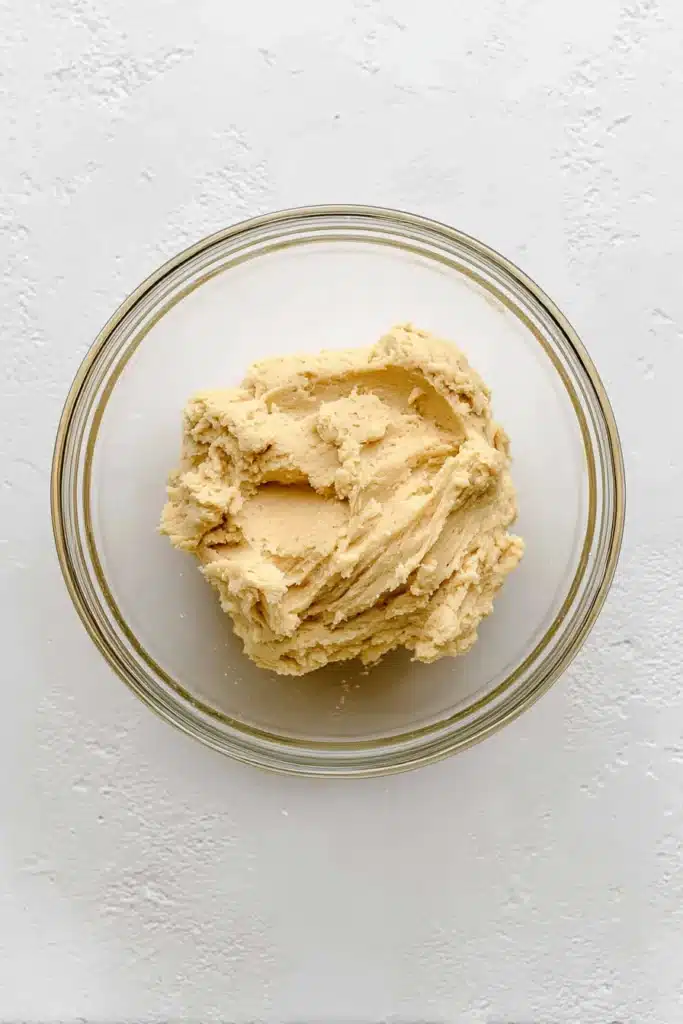 Frozen raspberries added to Lemon Raspberry Cookies dough before mixing