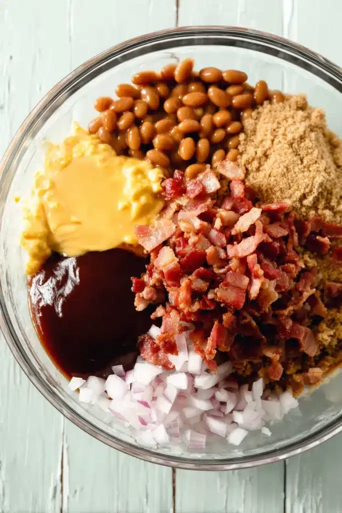 BBQ Baked Beans 2 BBQ Baked Beans ingredients in a glass bowl before mixing
