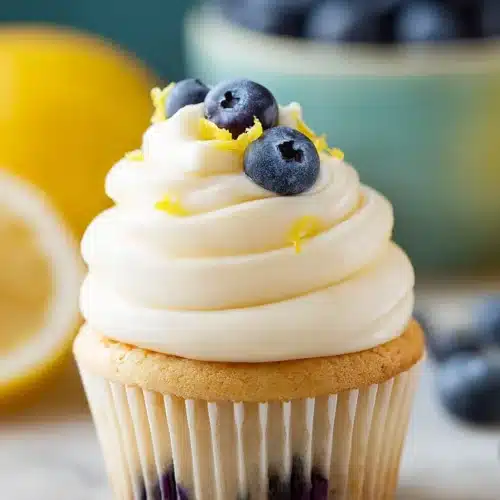 Lemon Blueberry Cupcakes 5 Lemon blueberry cupcake with cream cheese frosting and fresh blueberries