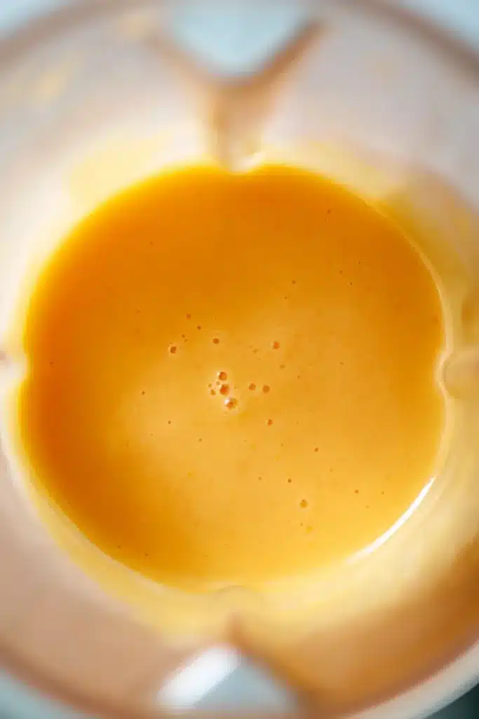 Peach Sorbet 3 Smooth Peach Sorbet puree blended until creamy in a blender