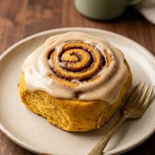 Pumpkin Cinnamon Rolls: Cozy, Soft, and Delicious 6 Pumpkin cinnamon roll with creamy brown butter cream cheese frosting