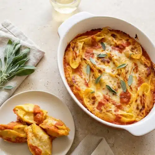 Pumpkin Ricotta Stuffed Shells: Easy, Cozy Fall Dinner 6 Pumpkin ricotta stuffed shells with tomato sauce, melted mozzarella, and fresh sage